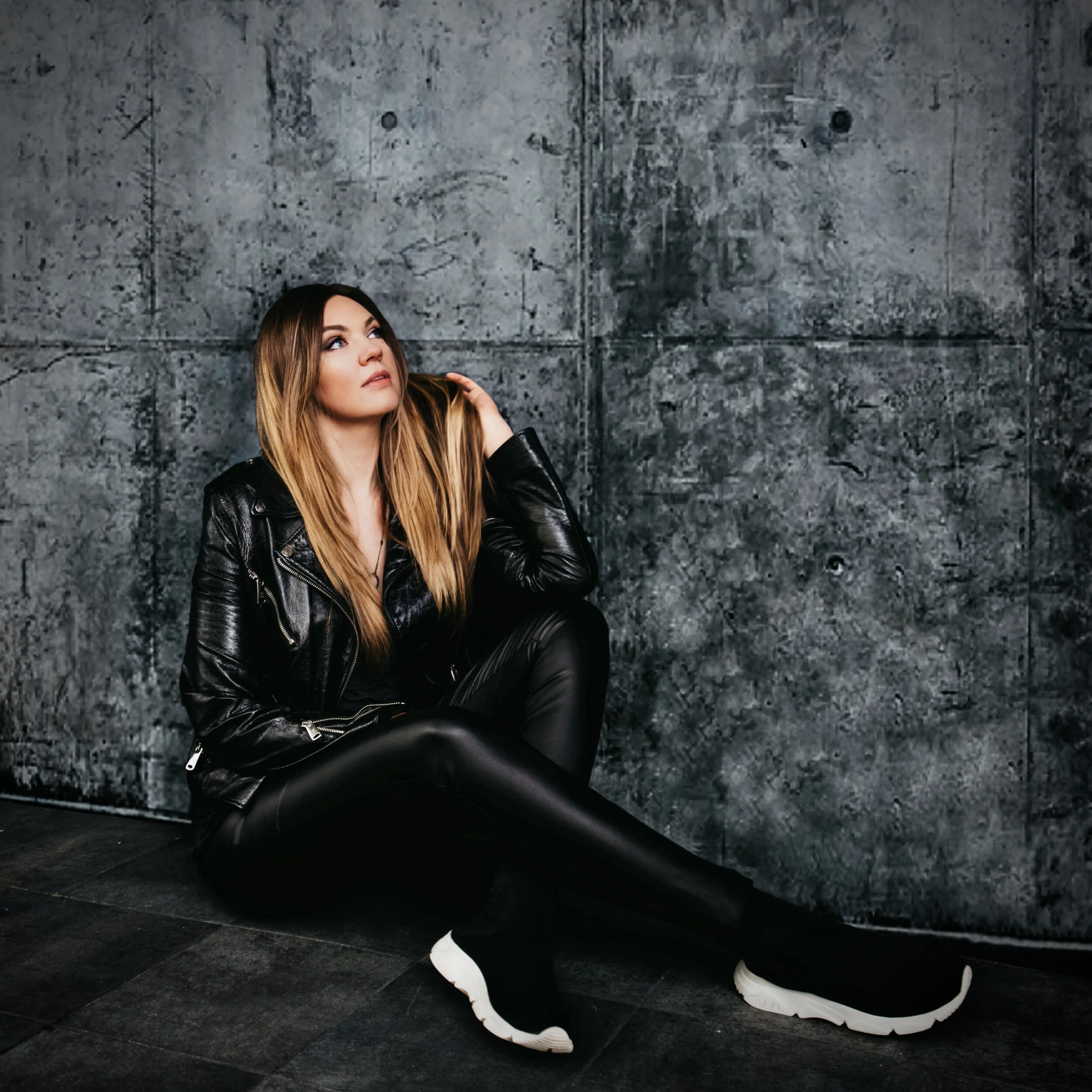 INNESSA KUZ CREATING ELECTRONIC DANCE ROCK MUSIC