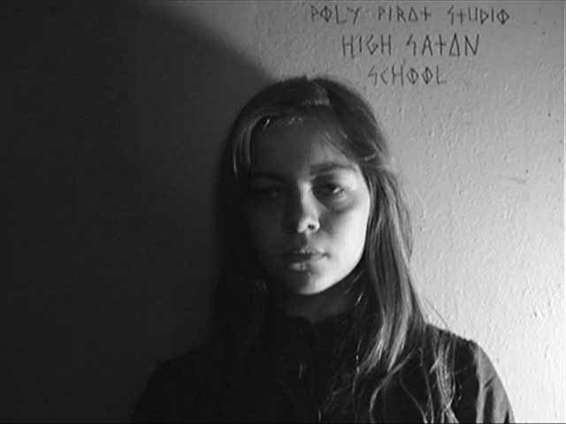 POLINA HOLDING THE MIRROR