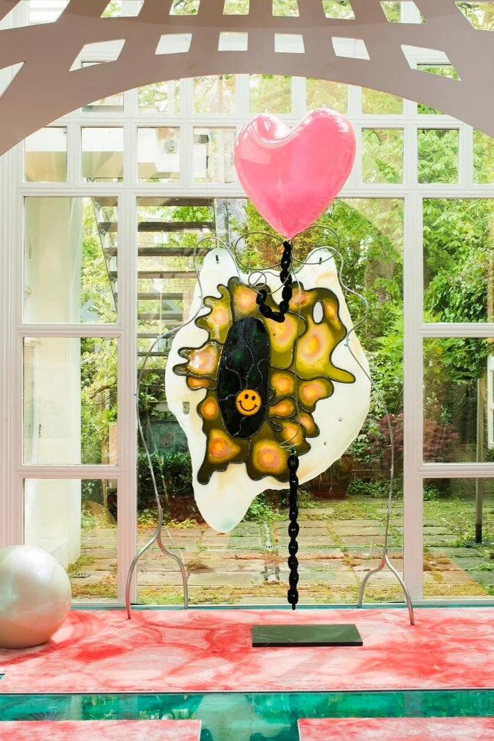 The Cosmic House: A Postmodern Playground for the Imagination