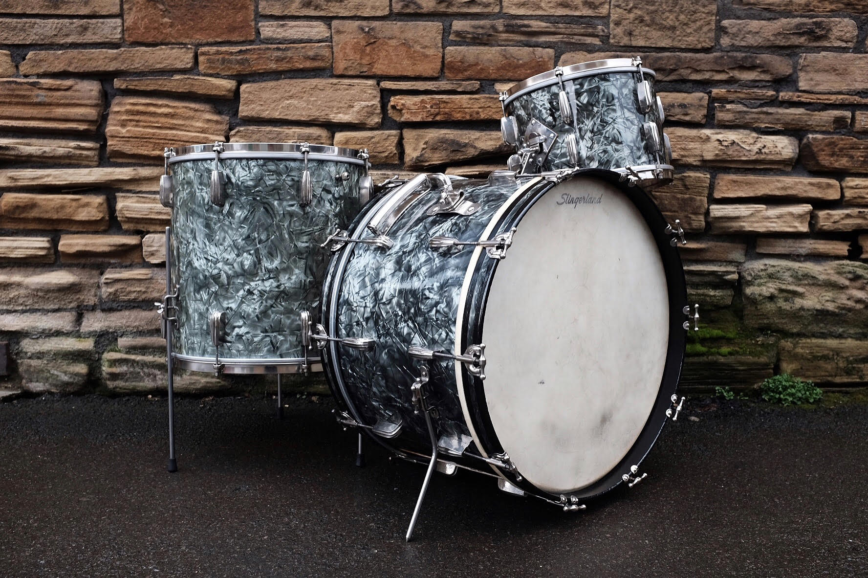 Circa 1955 Slingerland 'Gene Krupa Deluxe' Radio King, sized 22", 13", 16" in original black diamond pearl. Restored and sold in January/February 2017.