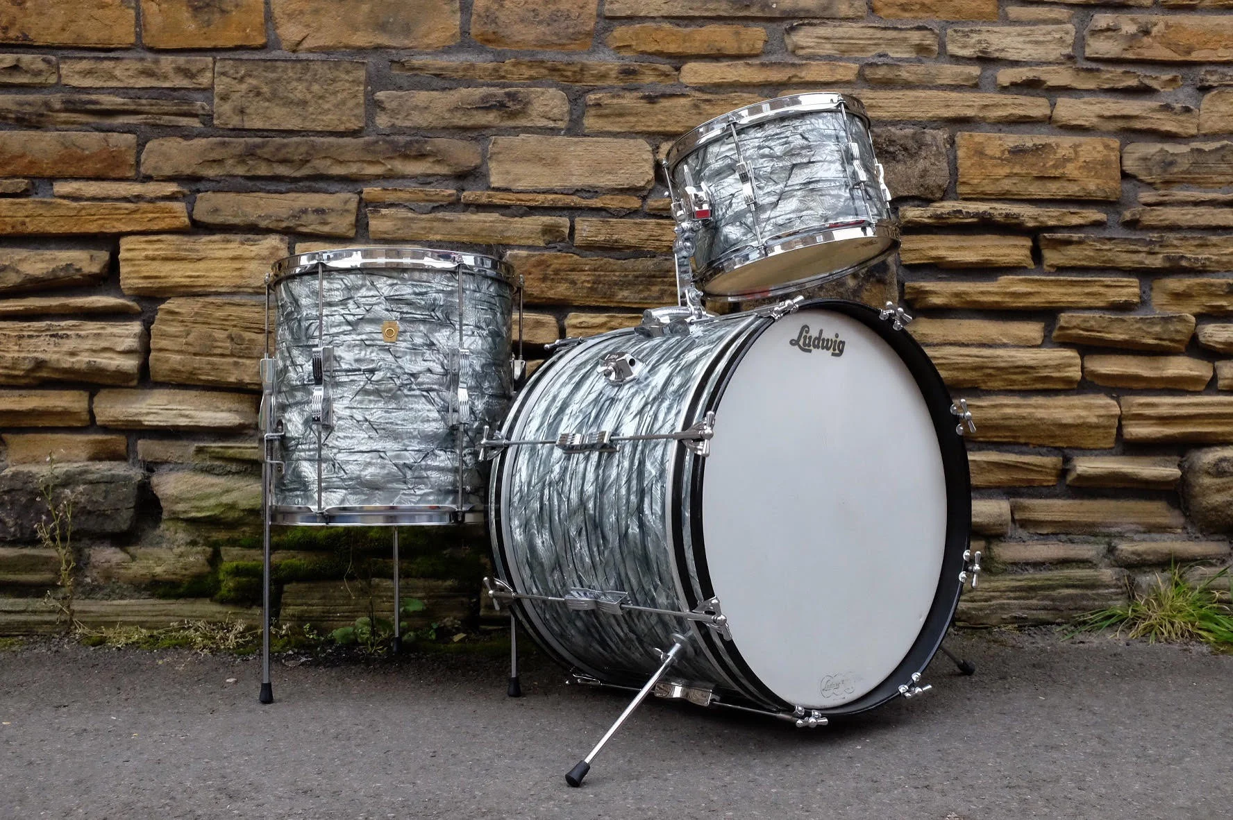 1966 Ludwig 'Club Date' in Sky Blue Pearl sized 20", 12" & 14". Restored and sold in September 2017.