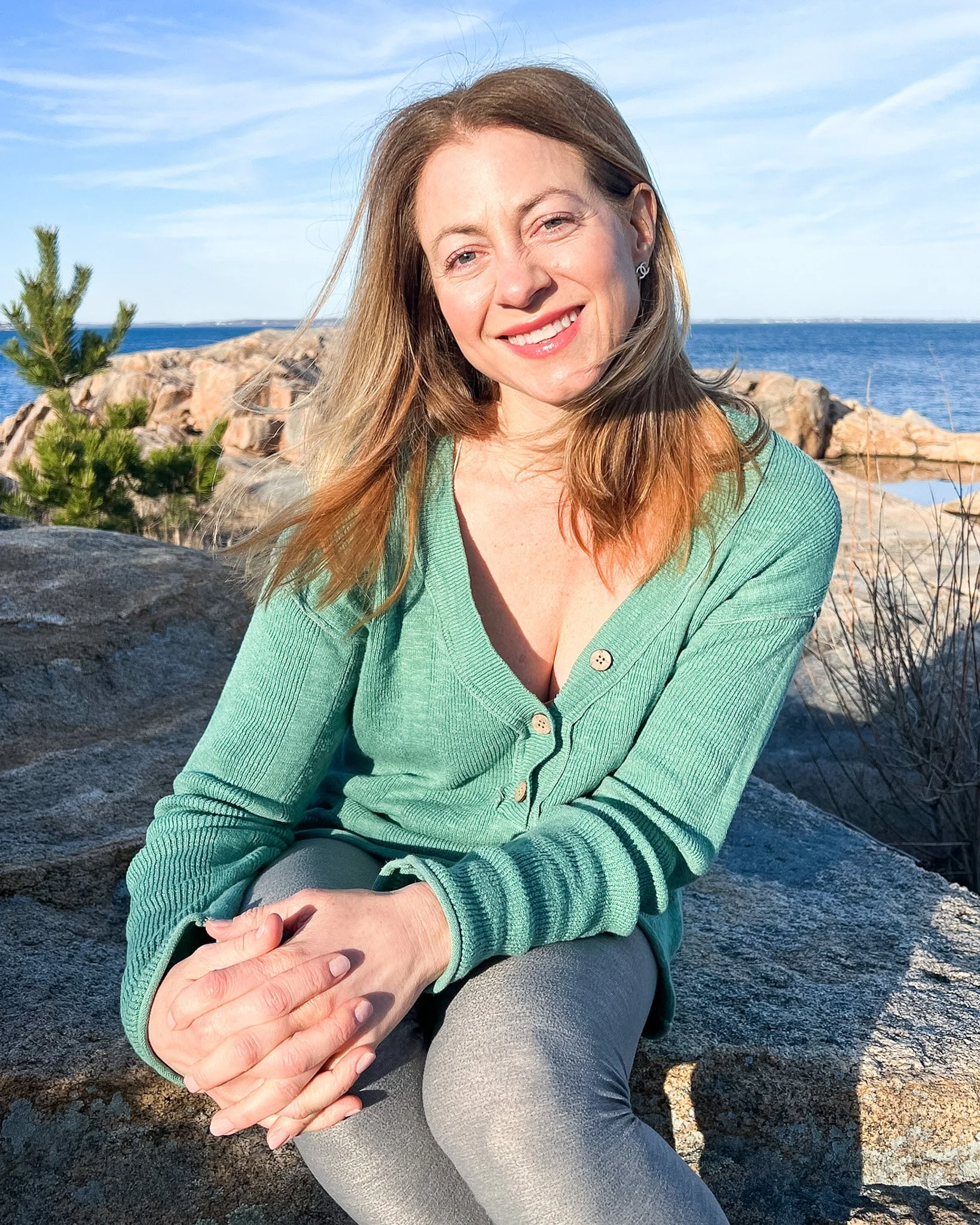 Jennifer Costanza wearing a light green sweater