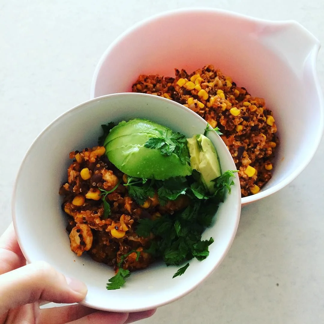 #Sunday = #BulkCooking = Guaranteed #healthymeals for most of the week. Pictured: “Latin” inspired chicken quinoa. Dice about 1lb of chicken. Cook chicken with a little olive oil and ½ onion until well done. Add 1 cup of veggie broth, ¾ cup of quinoa (I used tricolor), 1 cup drained, rinsed black beans, 1 cup of diced tomato, and 1 cup of corn. Boil for ~30 minues at low-medium heat. For garnish: avocado, lime, and A LOT of cilantro. S&P to taste. You can also add to a bed of greens, make lettuce tacos, or eat with a side of sauteed veggies. I also pureed this for Theo with a little added water. http://ift.tt/1PrBX7M
