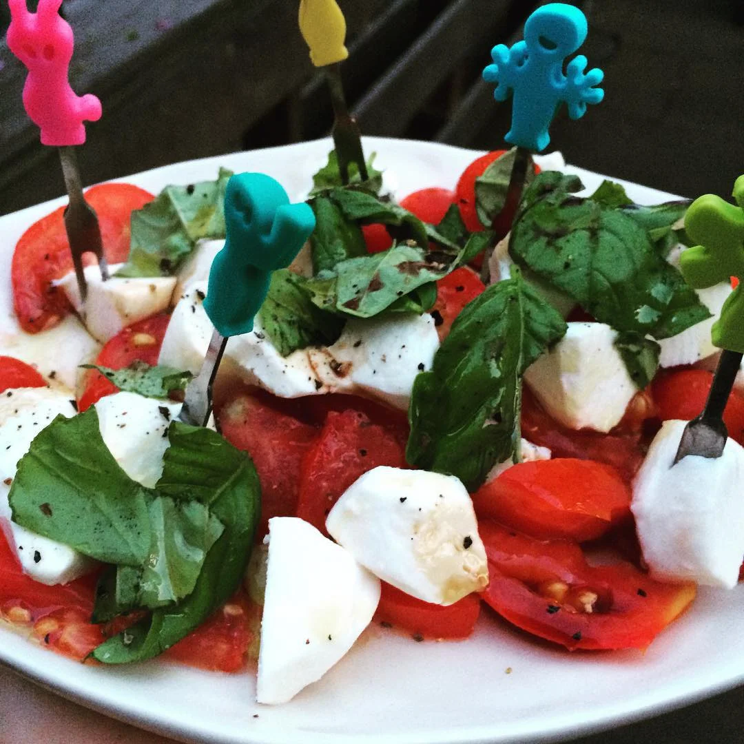 An oldie but a goody. #FreshBasil (#homegrown), #mozzarella, and #local #tomatoes (two different varieties from our beautiful, green thumb neighbors!) with balsamic and loads of #EVOO. The healthy #fat in the olive oil helps absorb all the fat soluble #vitamins in the tomatoes. #bushwick #bushwicknutrition #lazynutritionist #lazynutrition