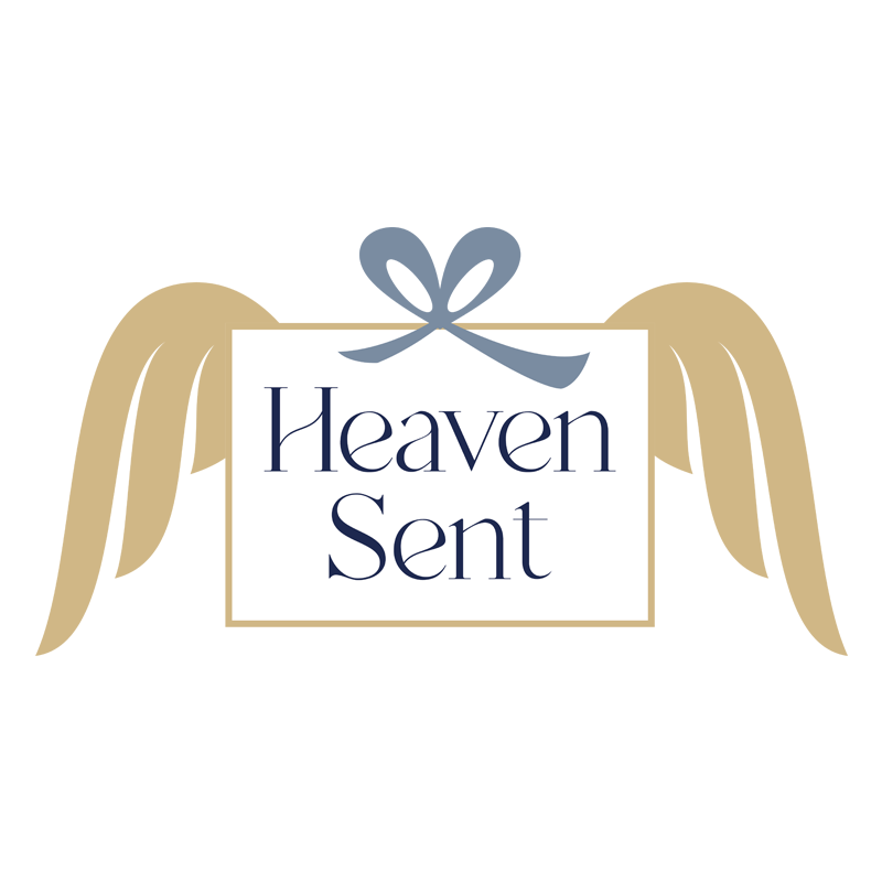 "Heaven Sent" text with stylized gold angel wings and blue bow on white background.