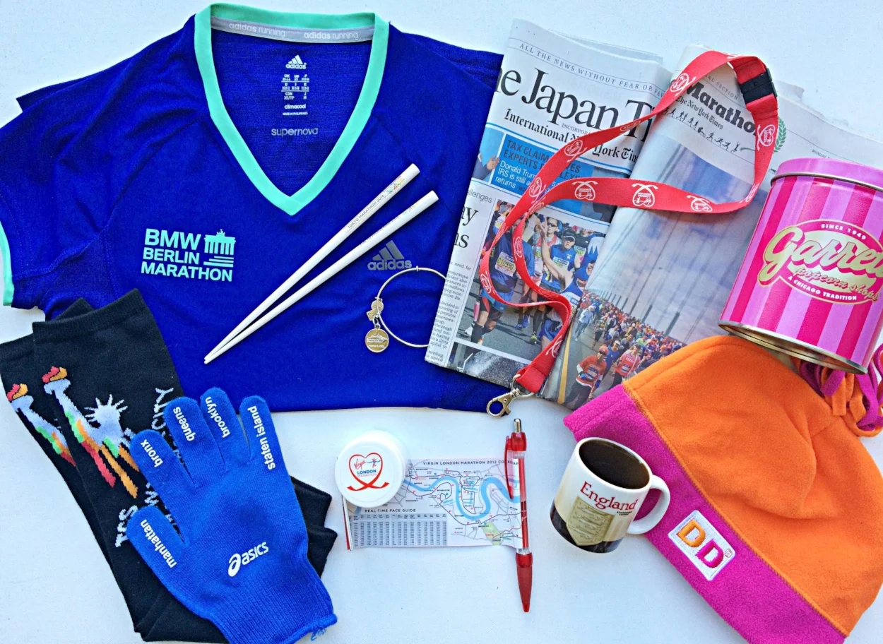Memorabilia from my Abbott World Marathon Majors: Berlin t-shirt, Tokyo Marathon chopsticks, Chicago Marathon bracelet, newspapers from the day after, Starbucks mug, Dunkin Donuts free hat from NYC, London Marathon pen with race map, London Marathon lanyard, NYC gloves and arm warmers and my favorite Chicago treat - Garrett's popcorn!