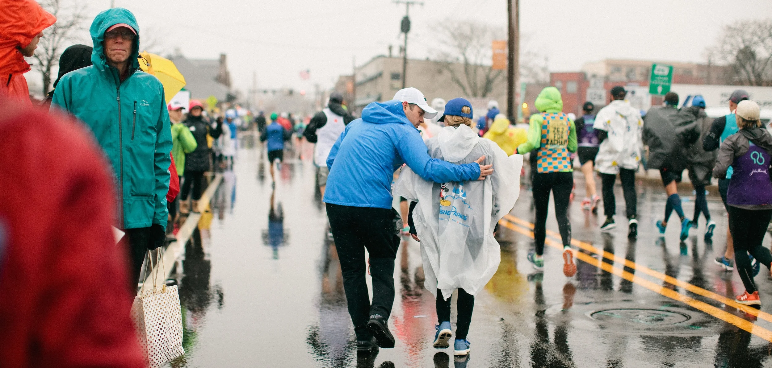 Mile 6 of the Boston Marathon. My husband giving me some encouragement. Photo by Tina Florance