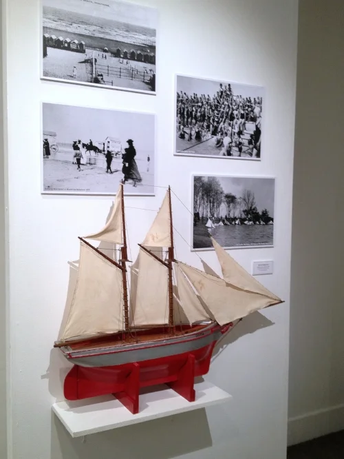 Sail boat toy and archival photographs from the Angus Council Collection