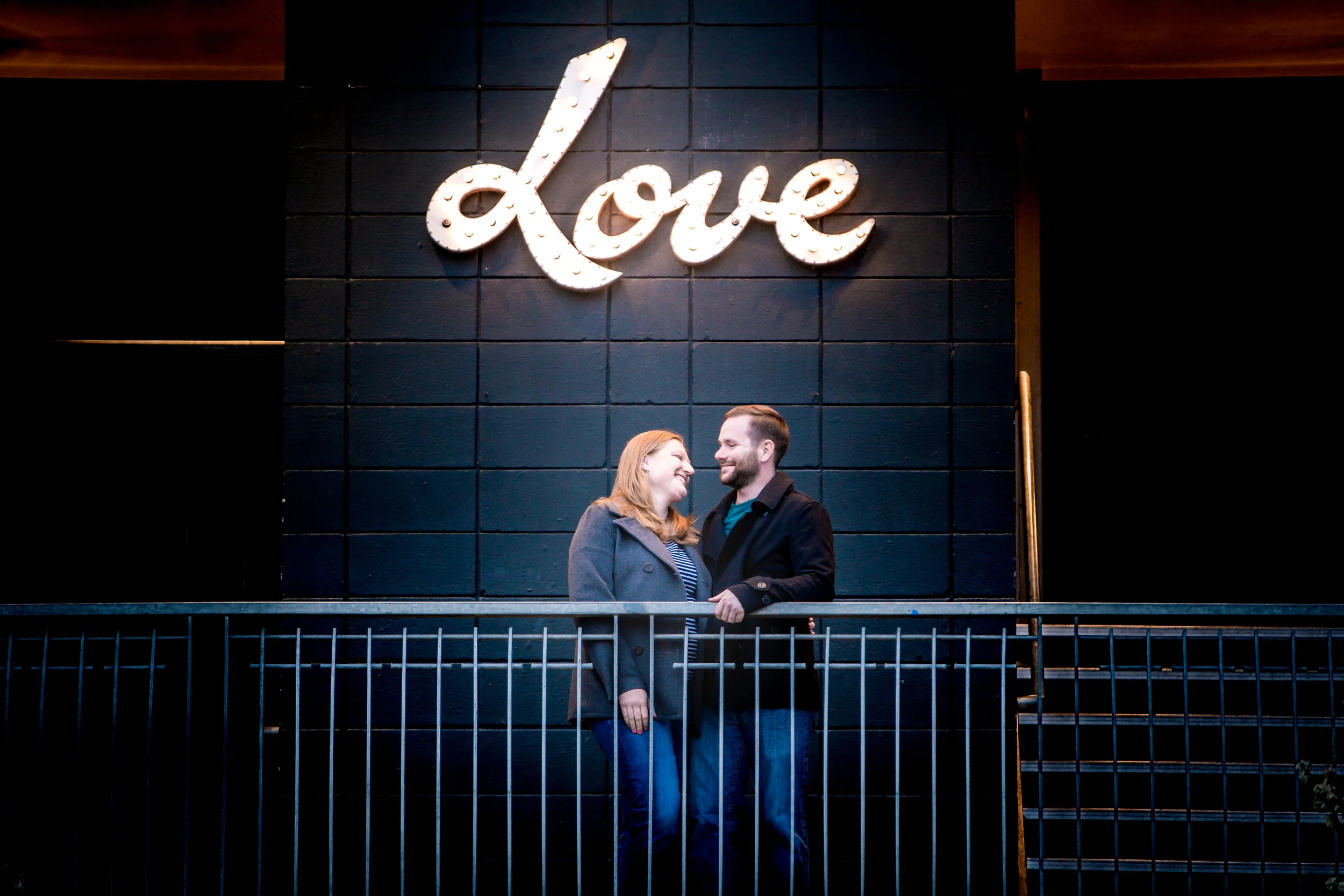 Engagements taken at the Rembrandt Yard Art Gallery LOVE sign in Boulder, Colorado
