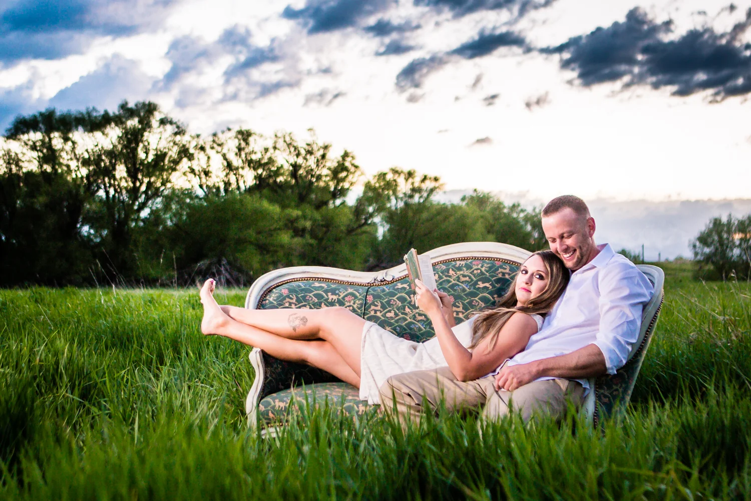 Reading during engagement session at Sandstone Ranch. Take by Jared M. Gant