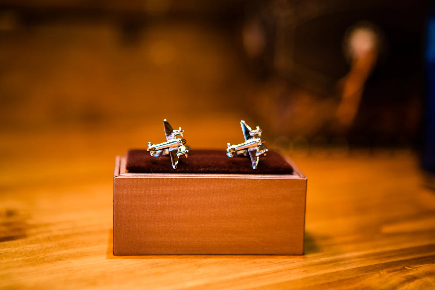 Airplane cufflinks for the groom. 