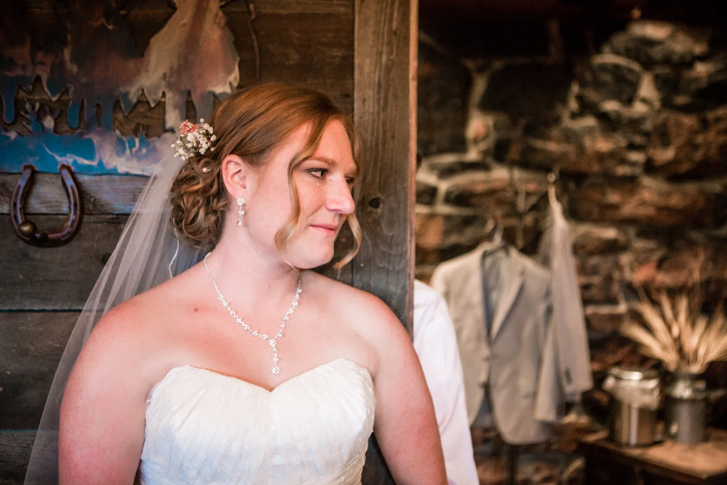 Bride and groom reading letters at their Deer Creek Valley Ranch Wedding. Photographed by JMGant Photography.