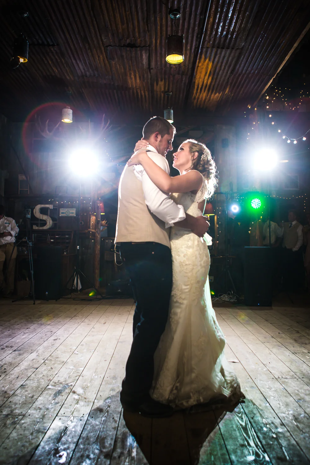 The bride and groom's first dance. Wedding at The barn at Evergreen Memorial. Photographed by JMGant Photography.