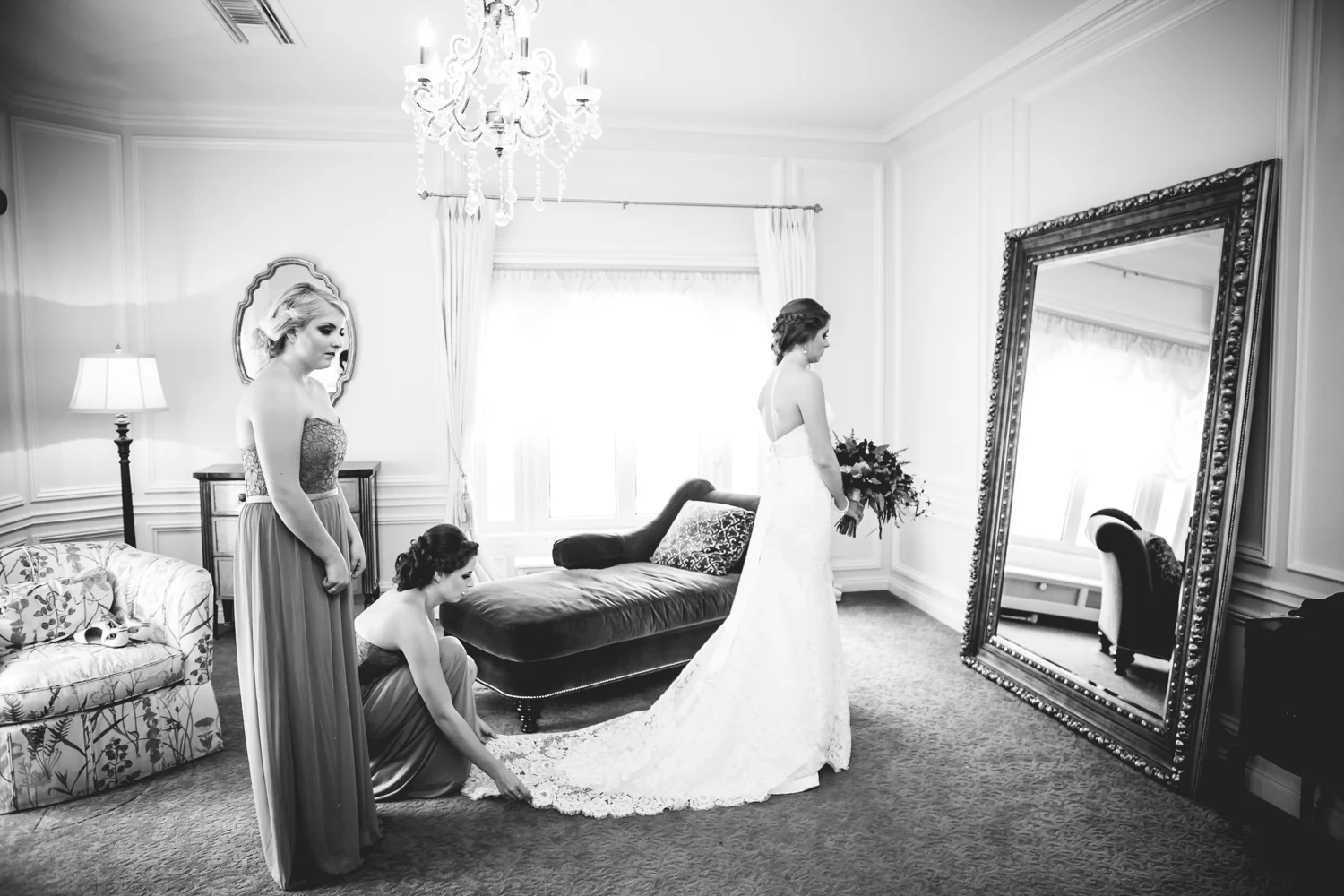 Bride getting ready in bridal suite at Highlands Ranch Mansion. Photographed by JMGant Photography, Denver Colorado wedding photographer. 