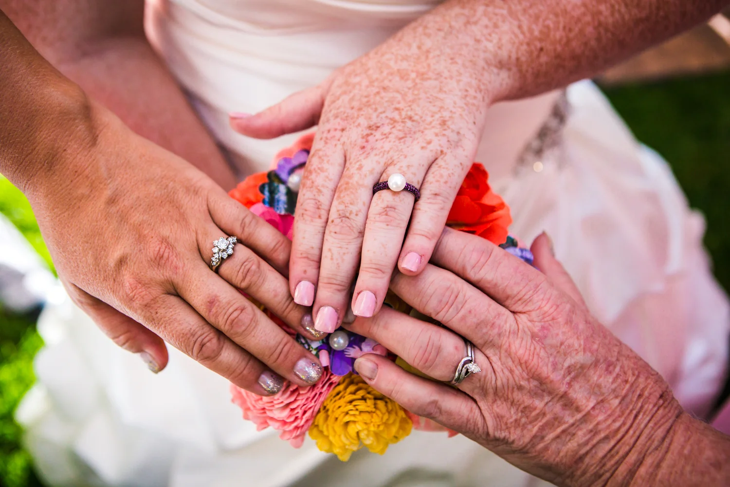 Three generations of wedding rings. Photographed by JMGant Photography.