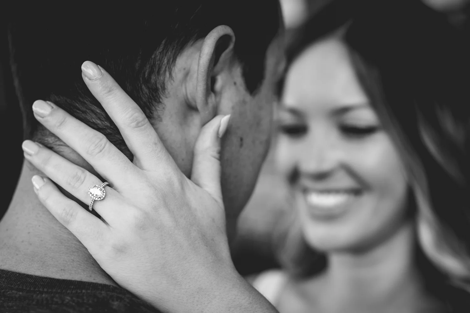 Downtown Denver engagement picture by JMGant Photography.