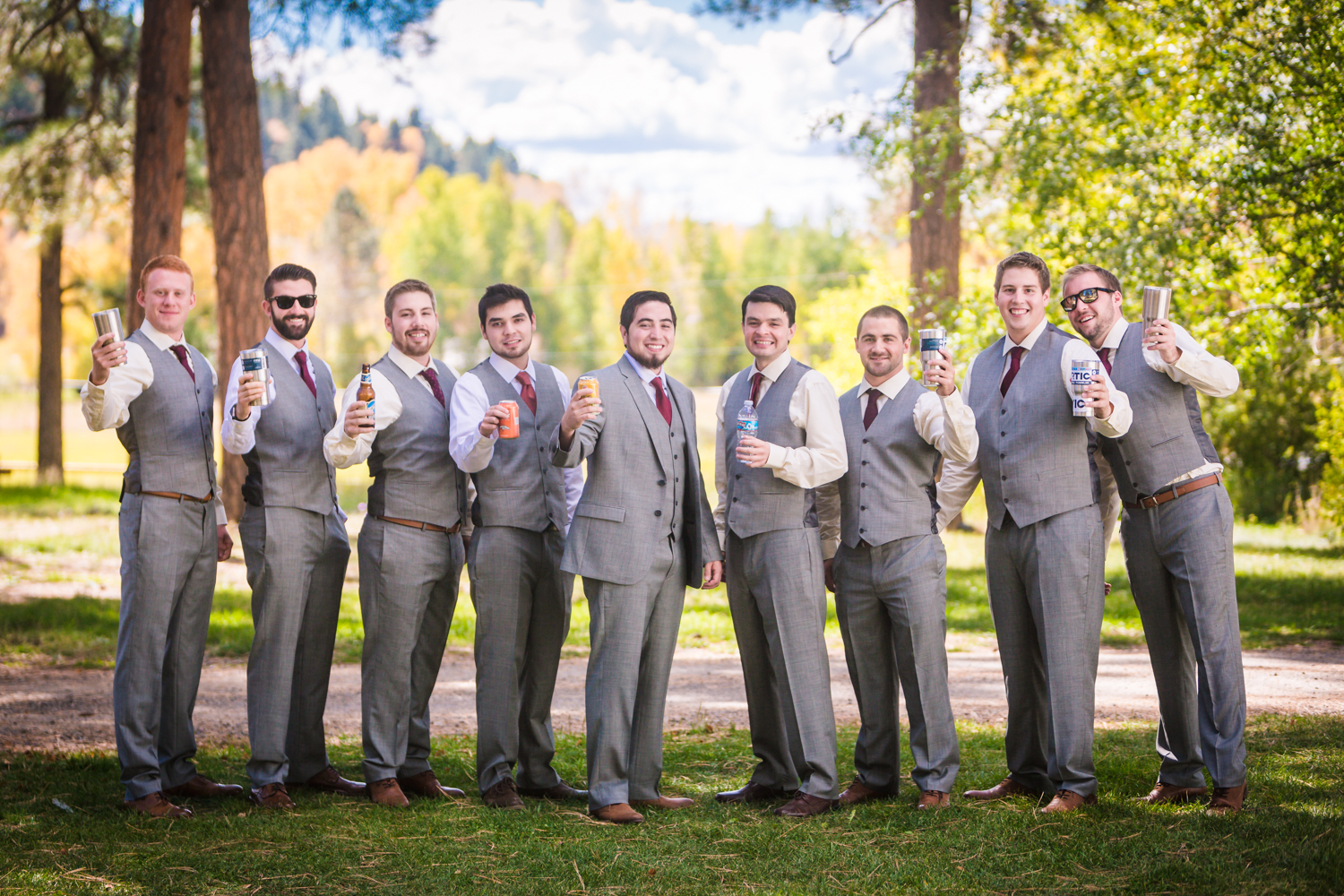 Groomsmen in grey suites by JMGant Photography.