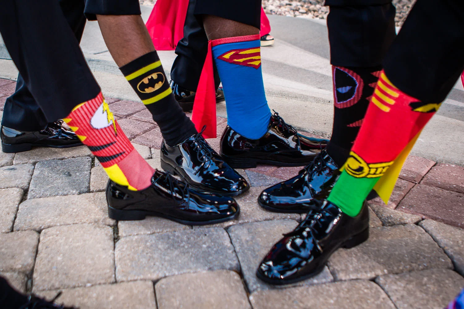 Blackstone Country Club wedding by JMGant Photography. The groomsmen and their super hero socks! 