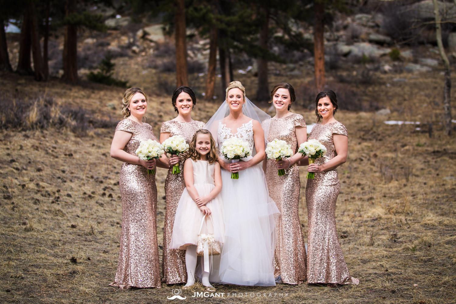 Stunning elegant wedding at the Della Terra Mountain Chateau in Estes Park Colorado. Photographed by Jared M. Gant of JMGant Photography.