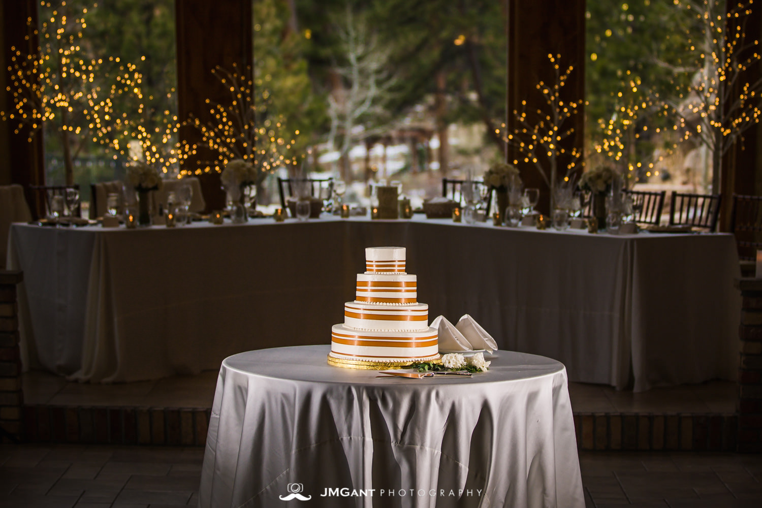 Stunning elegant wedding at the Della Terra Mountain Chateau in Estes Park Colorado. Photographed by Jared M. Gant of JMGant Photography.