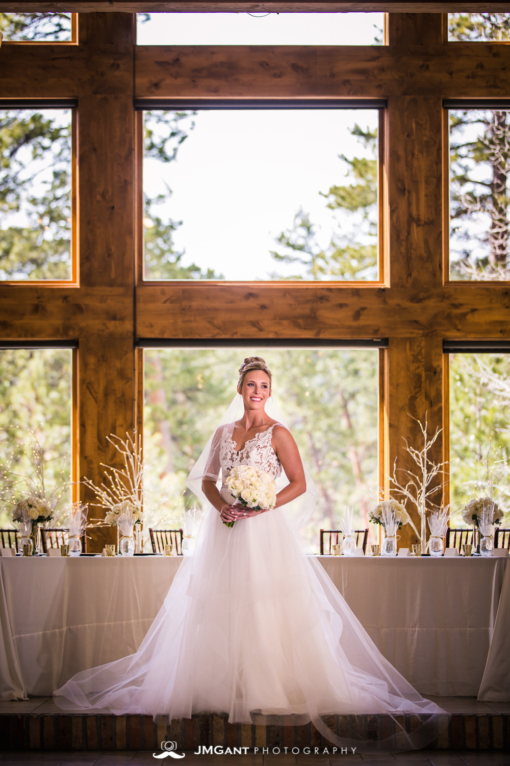 Stunning elegant wedding at the Della Terra Mountain Chateau in Estes Park Colorado. Photographed by Jared M. Gant of JMGant Photography.