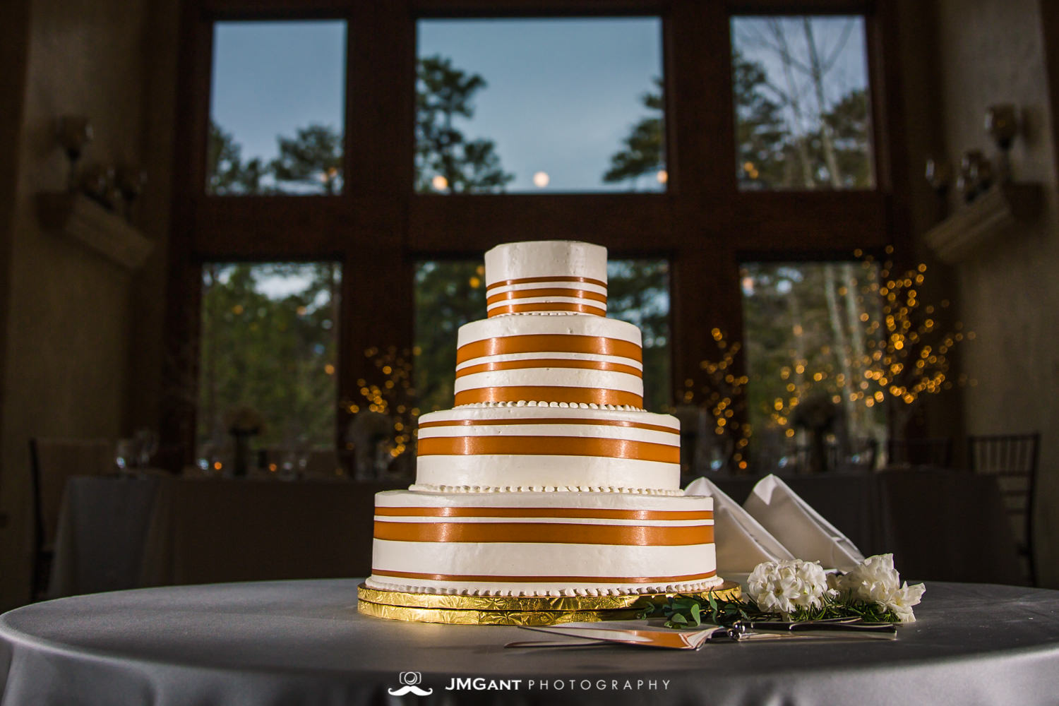 Indulge Bakery Wedding cakeat the Della Terra Mountain Chateau in Estes Park Colorado. Photographed by Jared M. Gant of JMGant Photography.
