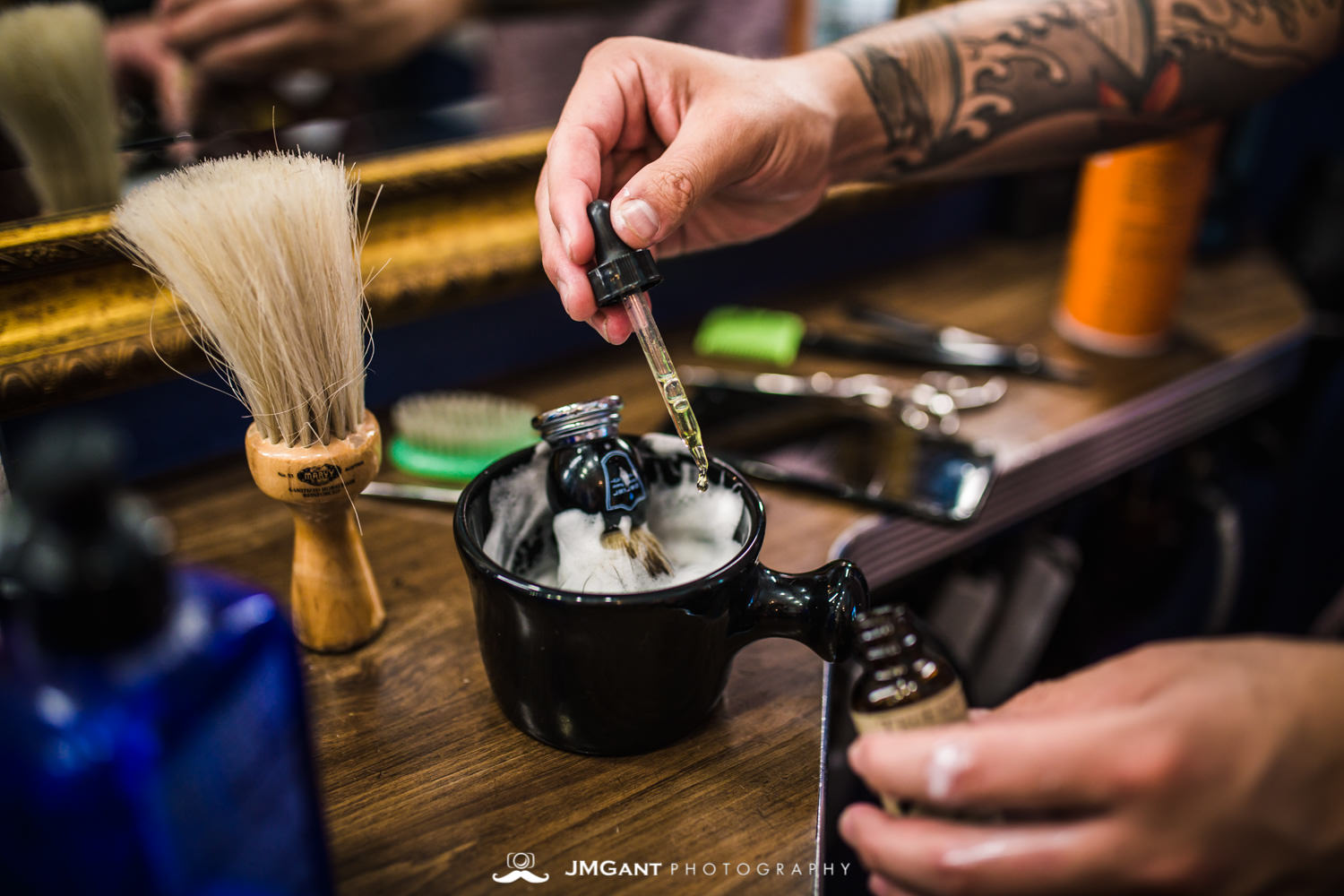 Groomsmen getting ready at the barborshop.