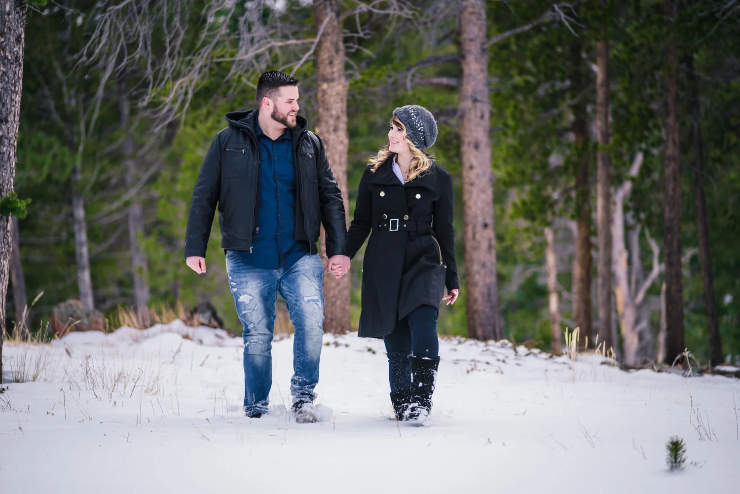 Snowy Estes Park Colorado engagement photos taken at Lily Lake in Rocky Mountain National. Photographed by JMGant Photography.
