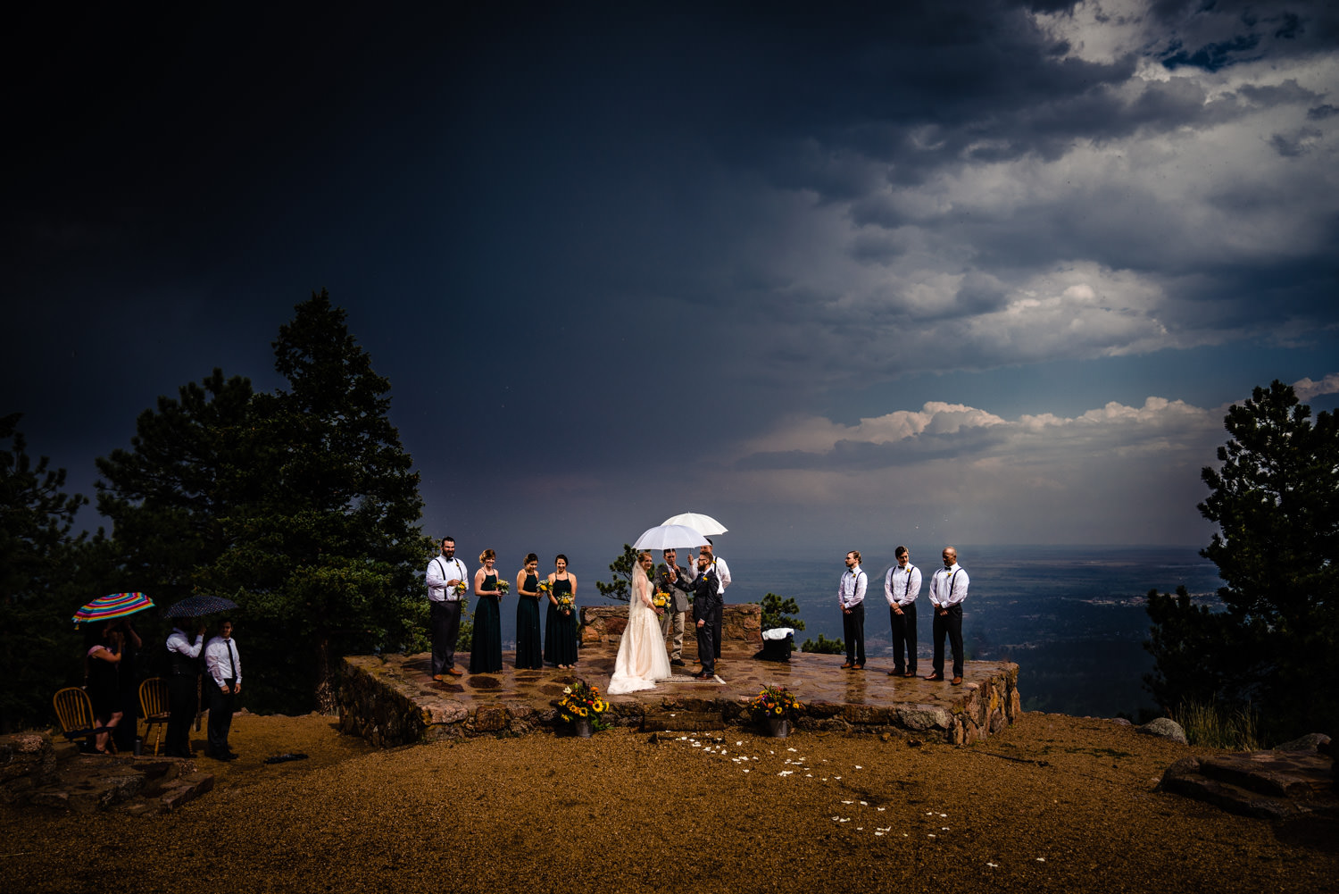 Rainy ceremony at Sunrise Amphitheater by wedding photographer, JMGant Photography