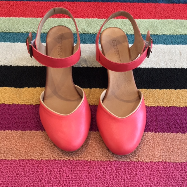 Add a bright pop of color to your outfit with these cute wedges by Ethem. 