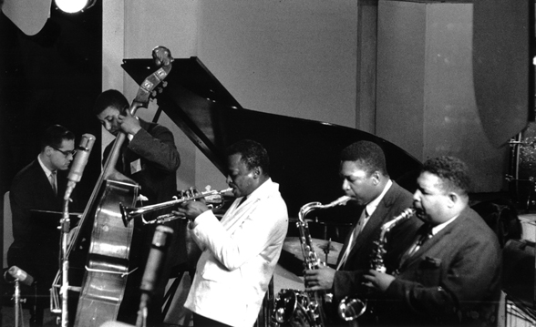 John Coltrane with Miles Davis. Masters of their tools, including of other musicians