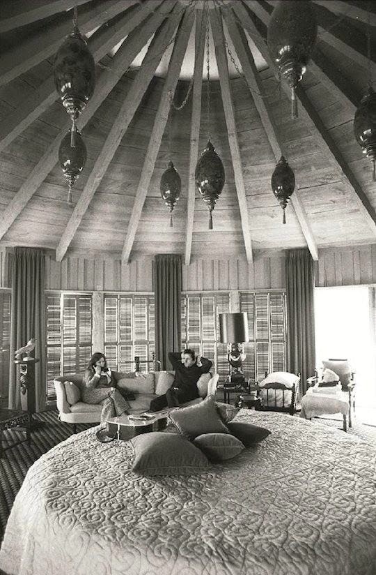 Big round bed? Johnny Cash and June relax