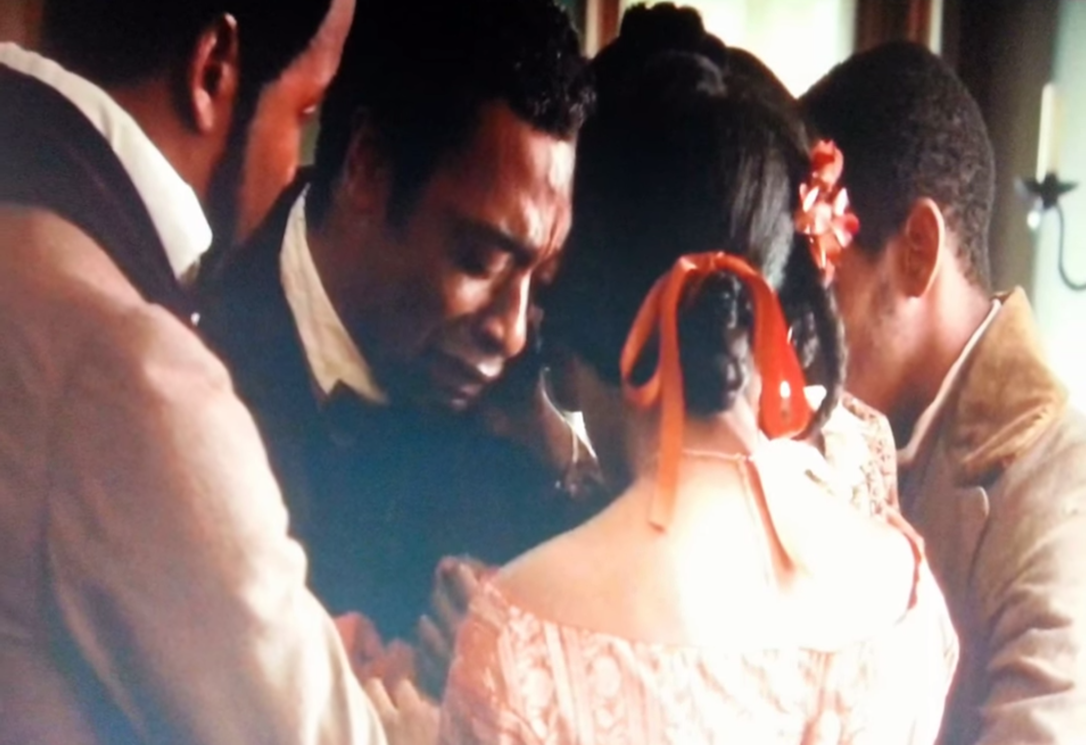 A tender moment in the powerful 12 Years A Slave (2013)