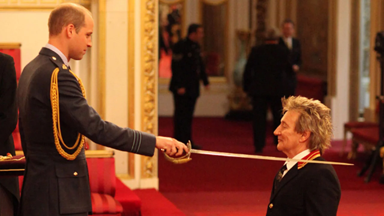 Arise Sir Rod? Mr Stewart gets the the nod, but here Prince William does the honours, not the Queen