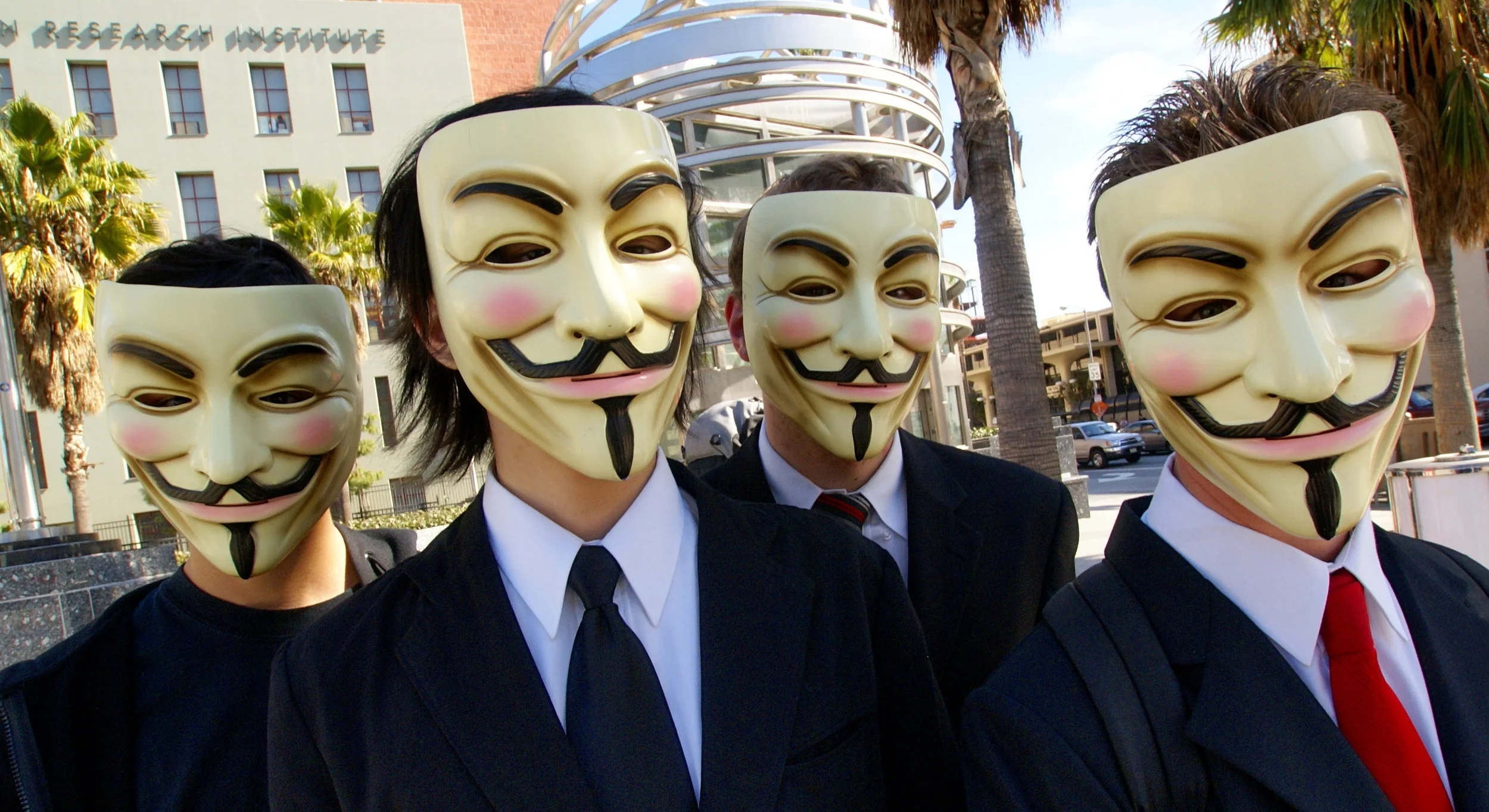 The masked faces of members of Anonymous, the hacking group, outside the Church of Scientology in Los Angeles