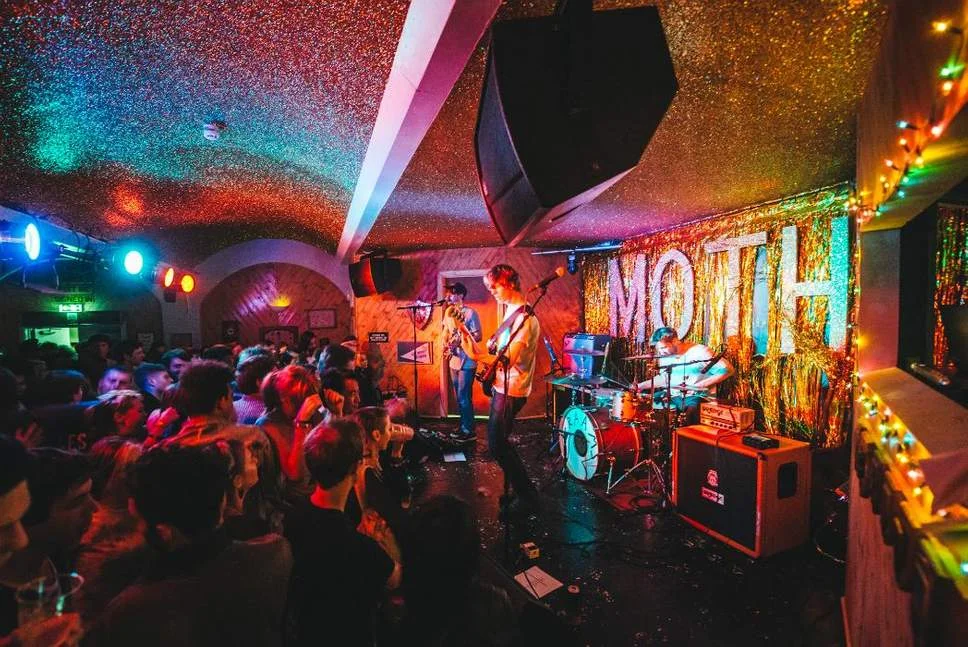 Hackney’s glittery Moth Club, which includes a sign that says “children must be off the dancefloor by 9.30”.