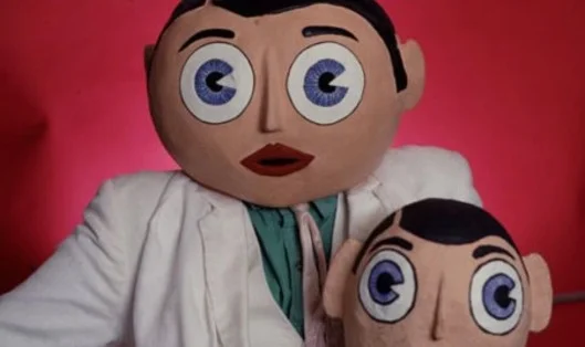 Spark of eccentricity: Frank Sidebottom (and little Frank)
