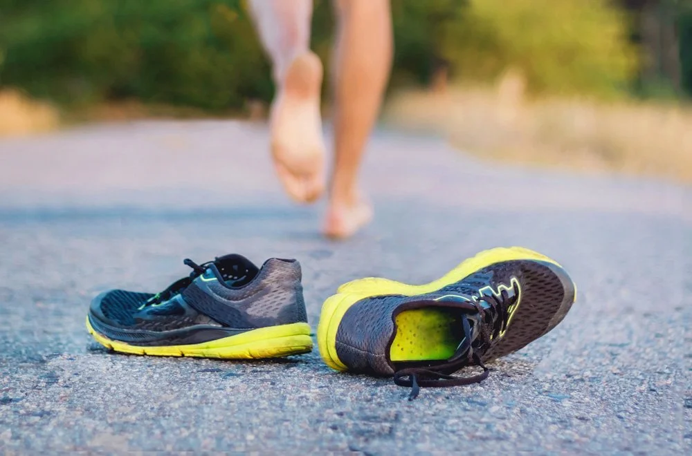 Running shoes and barefoot.jpeg