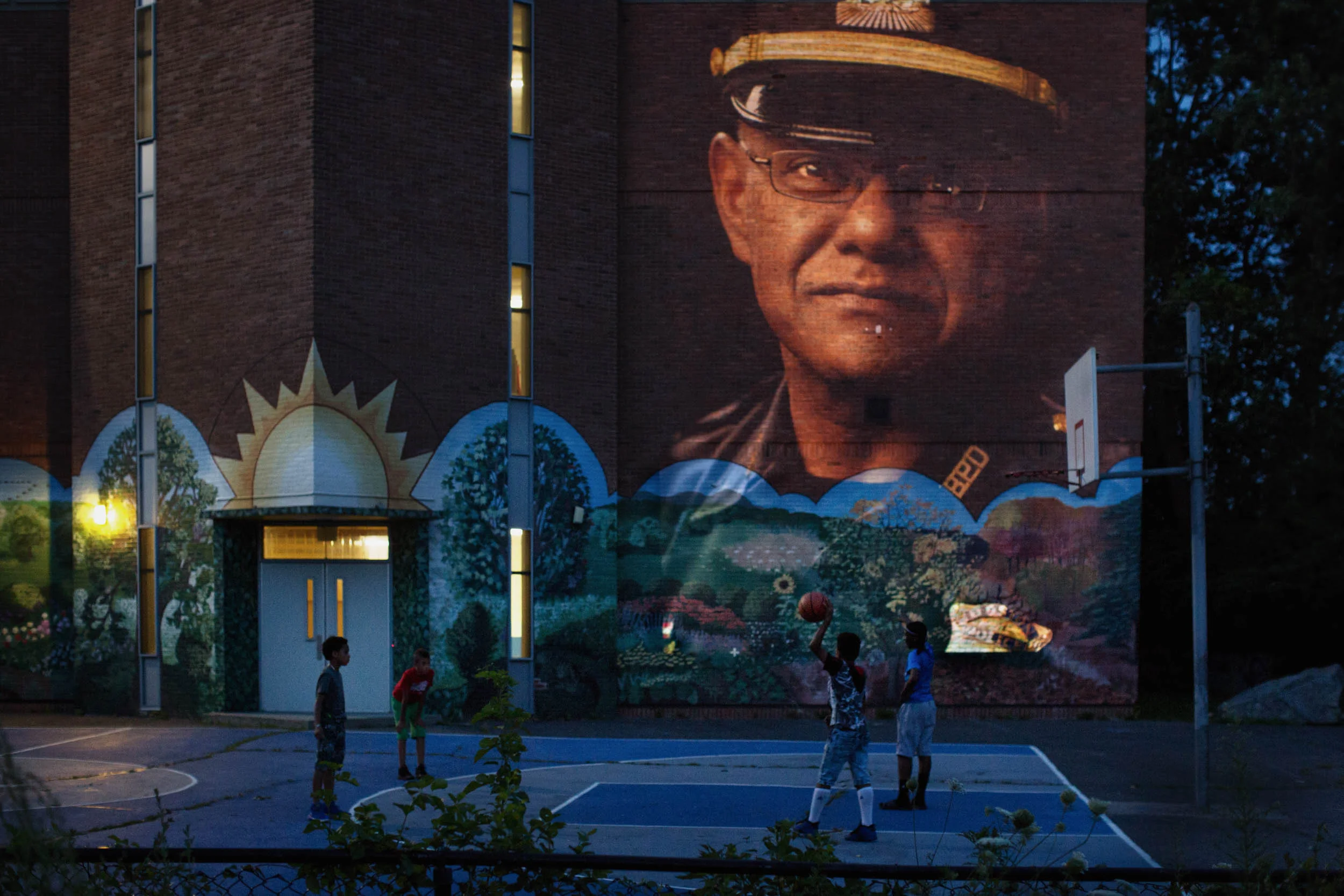 Haseeb Hosein | Trinidad Captain, Boston Police Department - Projected on the Lee School in the B-3 Police District where he works.