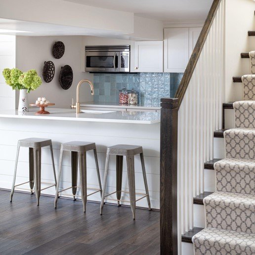 Kitchenette with refurbished stairs. 