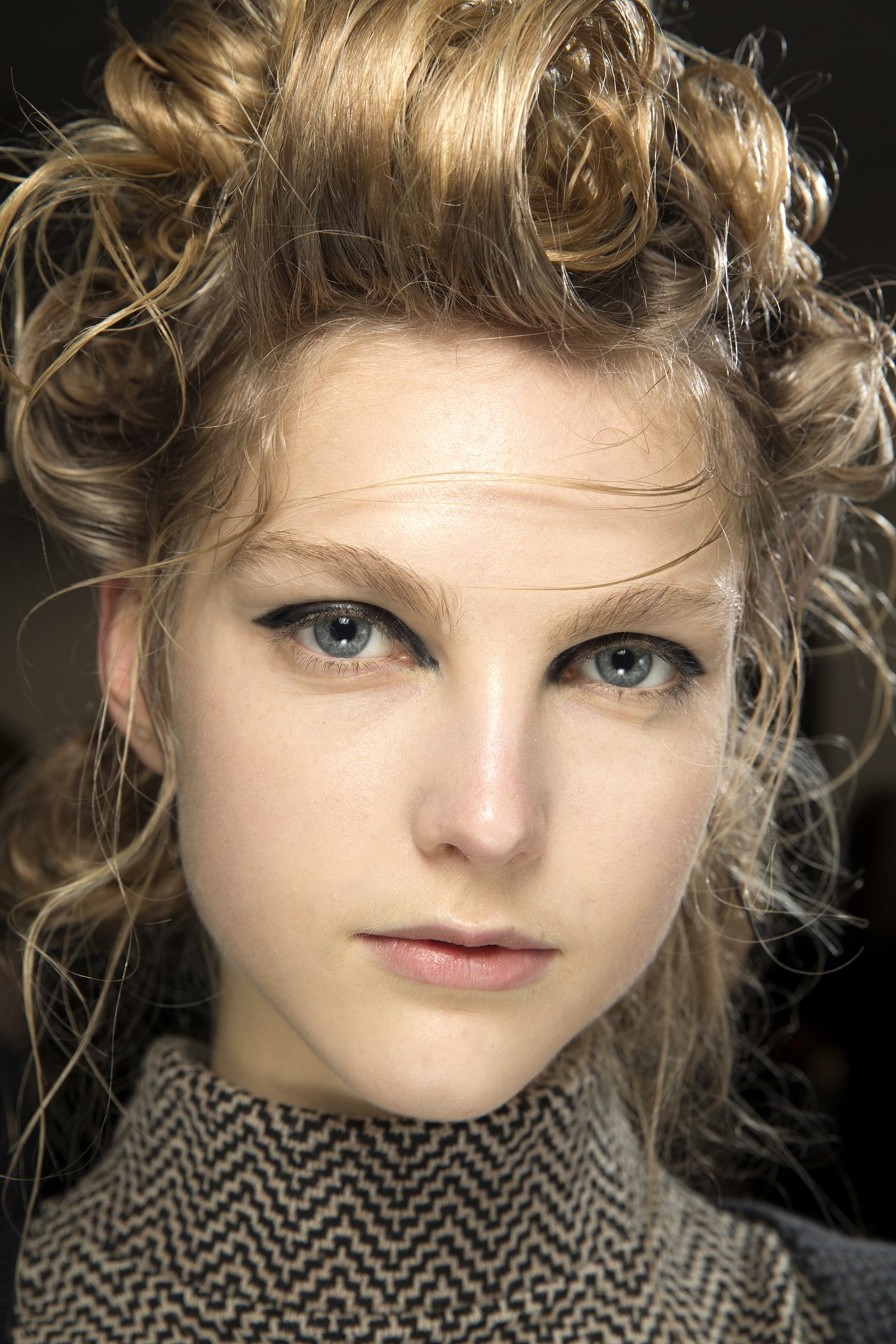 Simone Rocha - James Pecis styled the hair in piled-up up-dos with a wet-look finish.