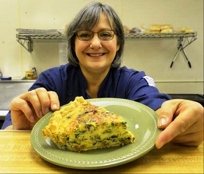 Serving up some quiche at Feast of Eden Cafe!