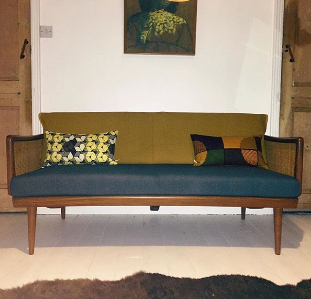 This pair of African print cushions looking fine on this gorgeous day bed.
