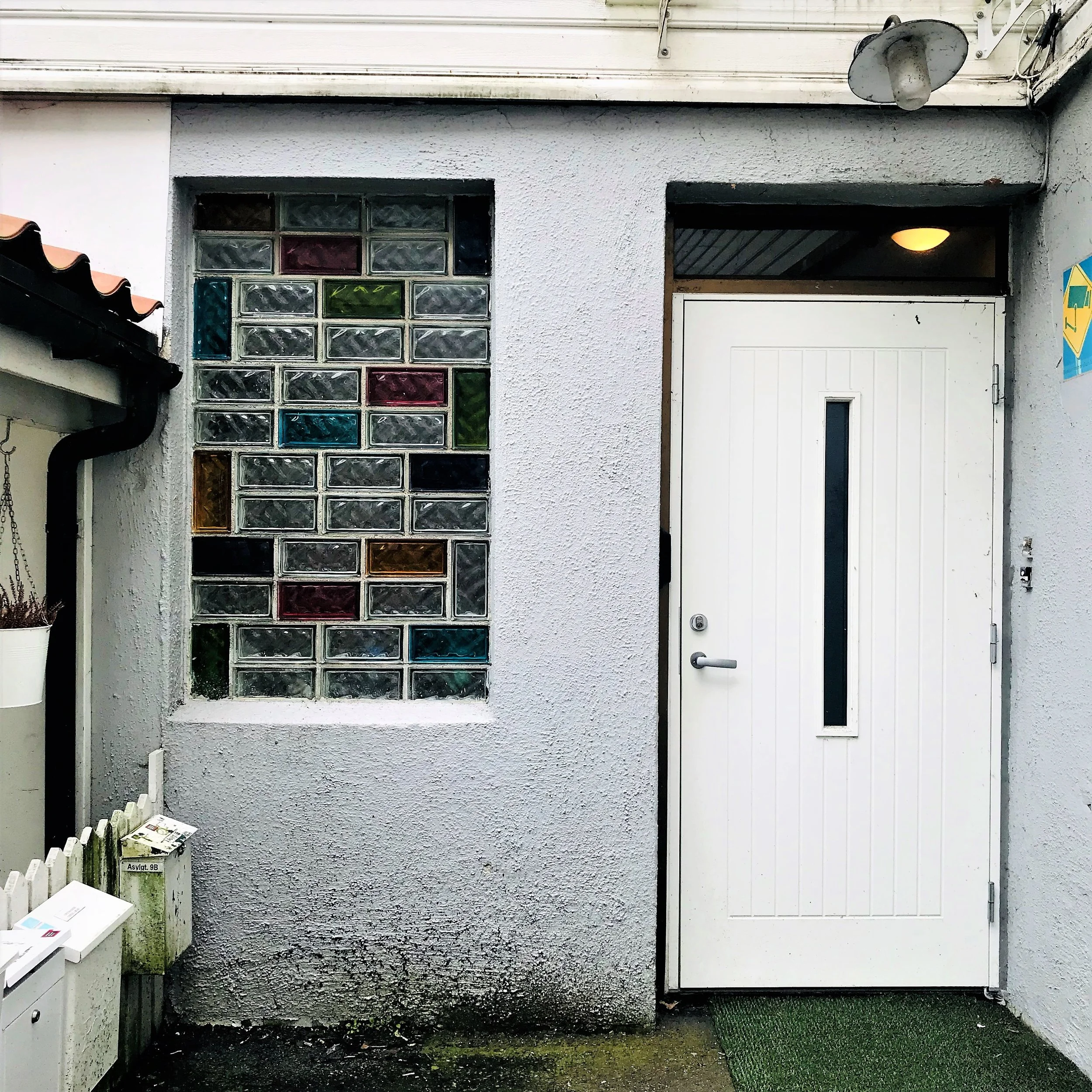 Interesting doorway with coloured glass bricks.