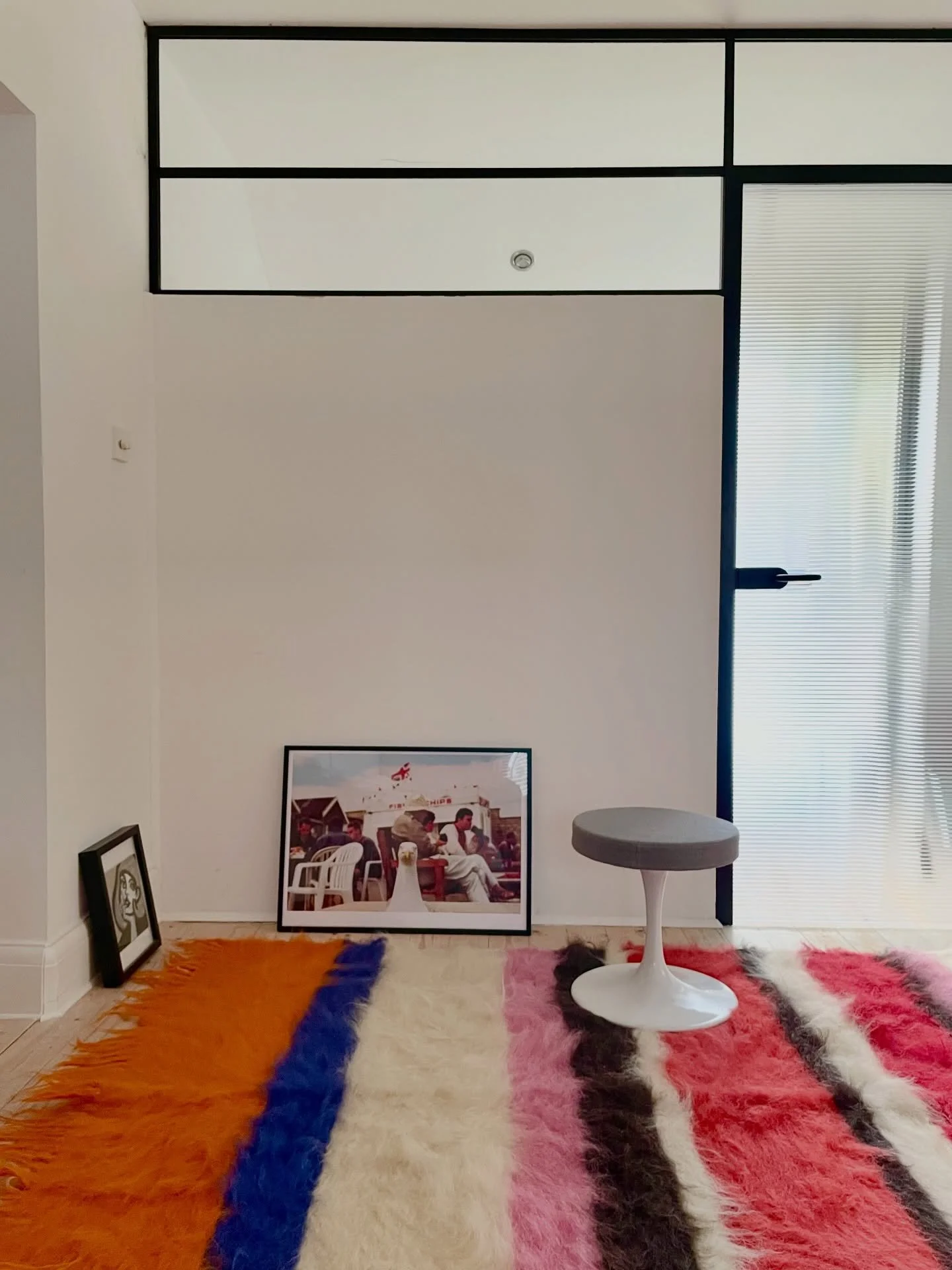 Ida Shag rug perfectly lifting a corner of a room. Created in Ukraine in a village with an ancient history of rug making. Natural dyes are used to give the most intense pure colour, washed in the icy rivers to soften the fibre before and after the wo