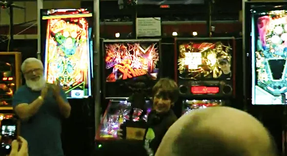 Escher just moments ago holding the giant PAPA World Championship trophy - screen captured from the PAPA live stream.