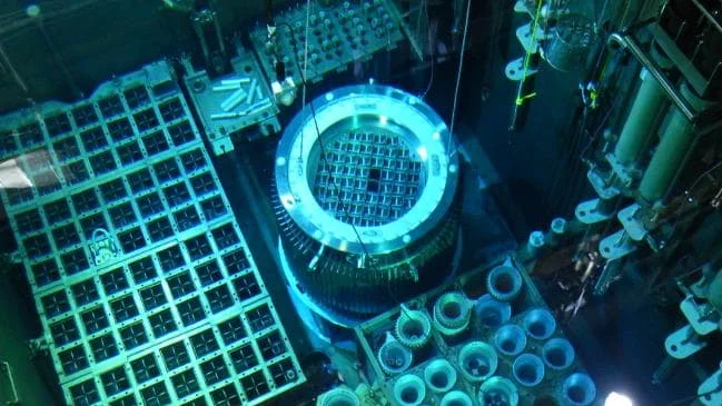 Spent fuel rods being unloaded in the reactor service pool at the Lucas Heights reactor.