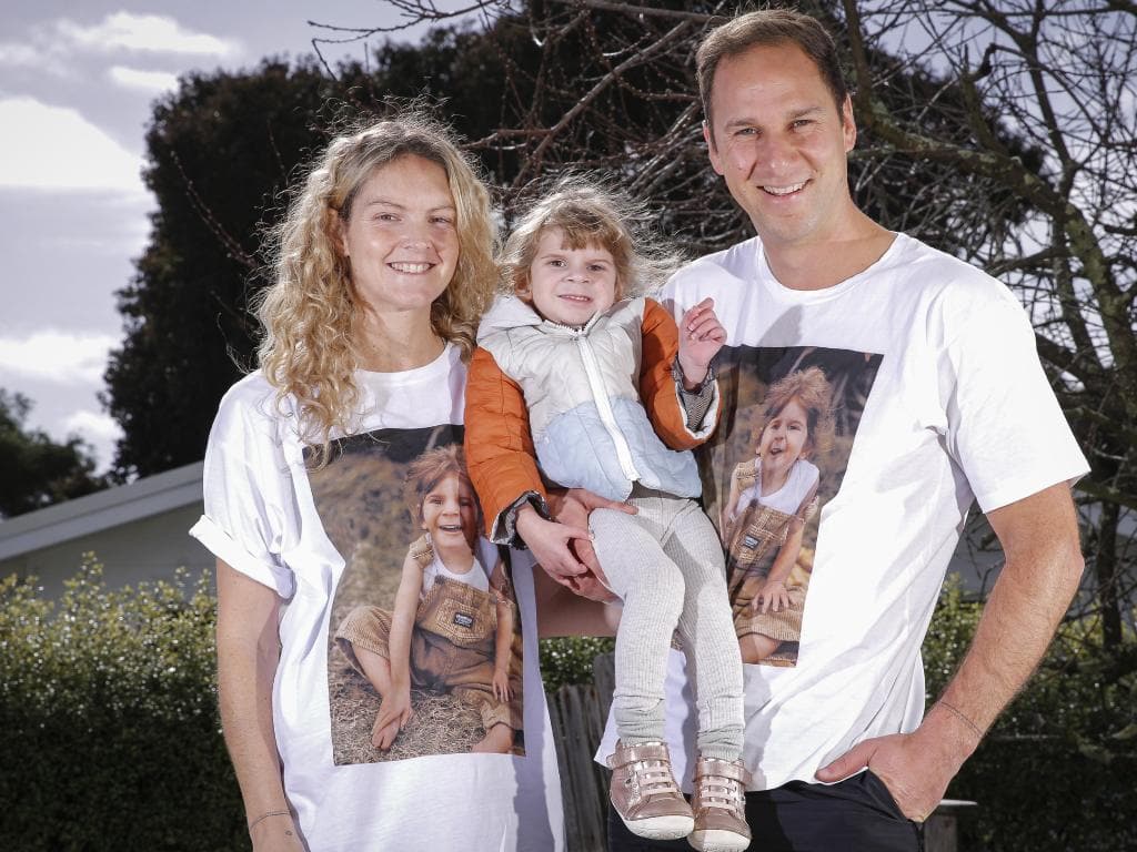 Joel and Sarah Hood with daughter Maeve, 3.