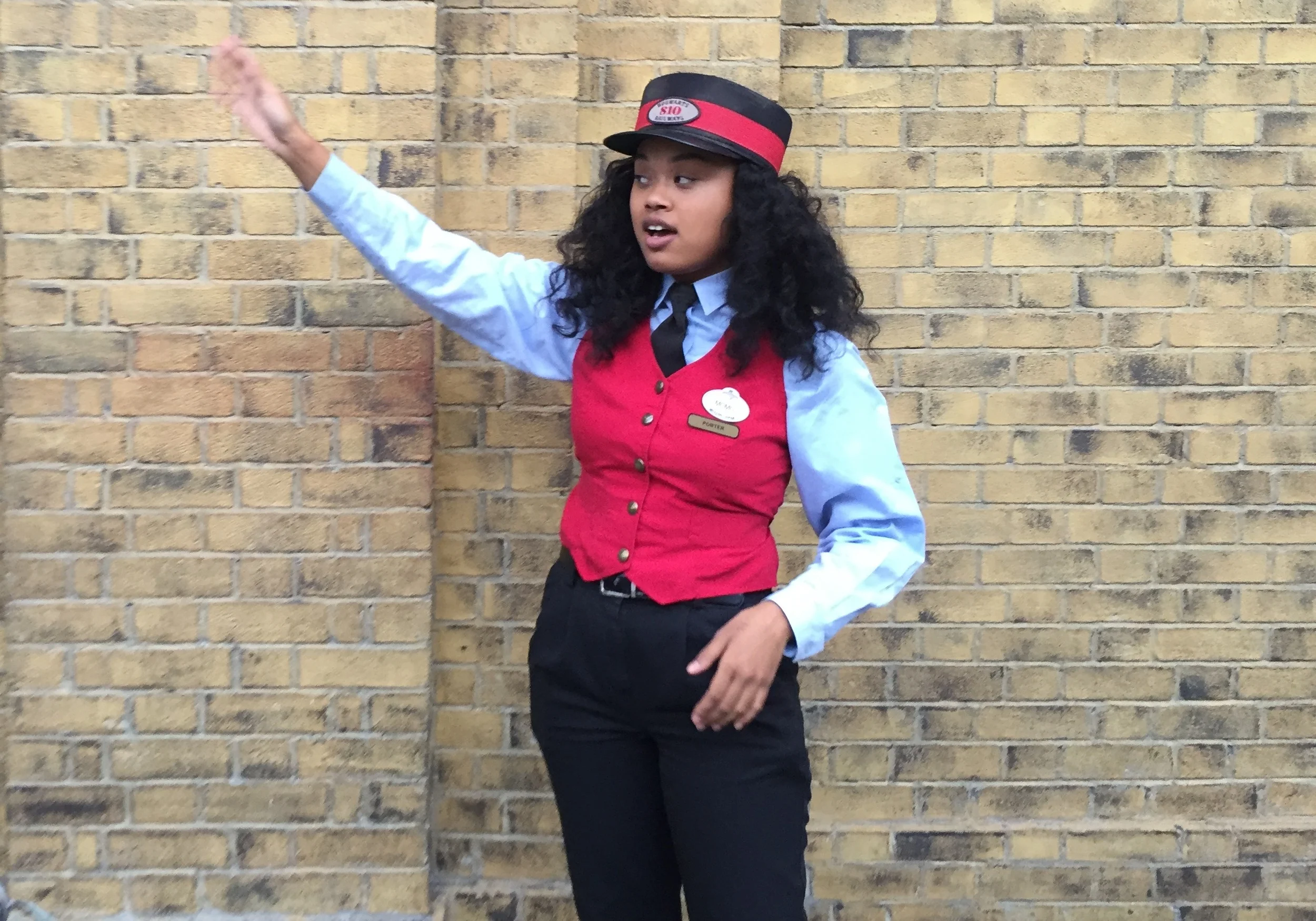 Porter at King's Cross Station near Platform 9 3/4.