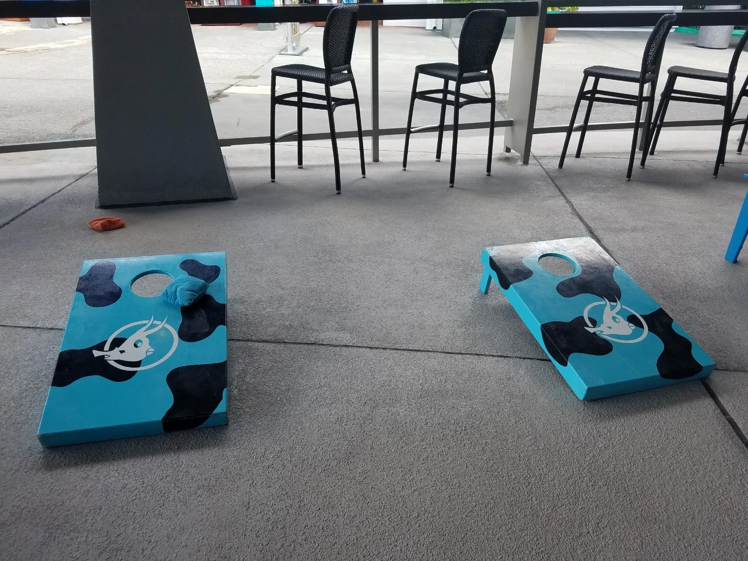 Play Corn Hole at Cowfish